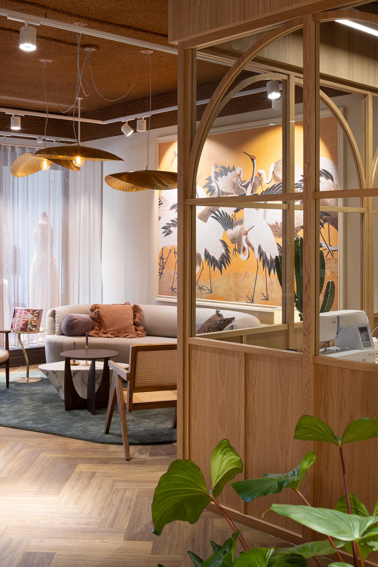 Stunning interior design, crane bird wall decoration, organic lines, sustainable natural interior design. Bridal boutique design. Hal2 interieur design
